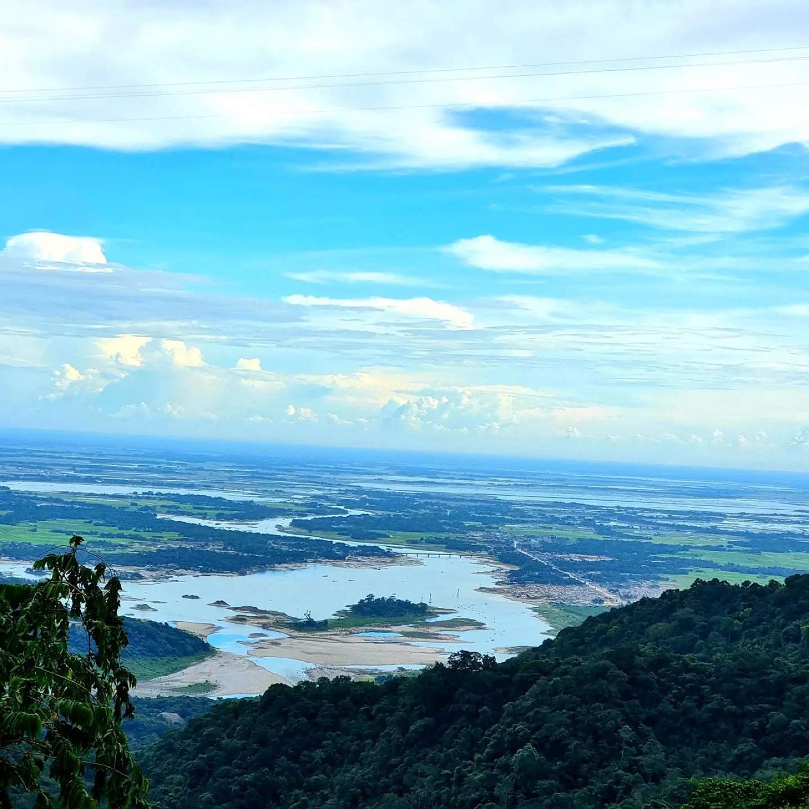 View from the Khasi Hills plateau near Cherrapunji looking south toward the flat plains of Bangladesh, the terrain that forces monsoon air upward into the region's extreme rainfall